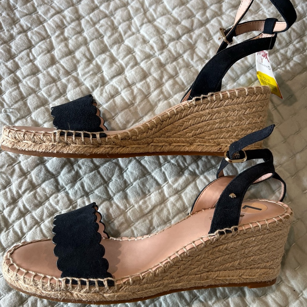 Kate Spade blue sandals. NWT size 7.  Bought but haven’t worn so passing on.